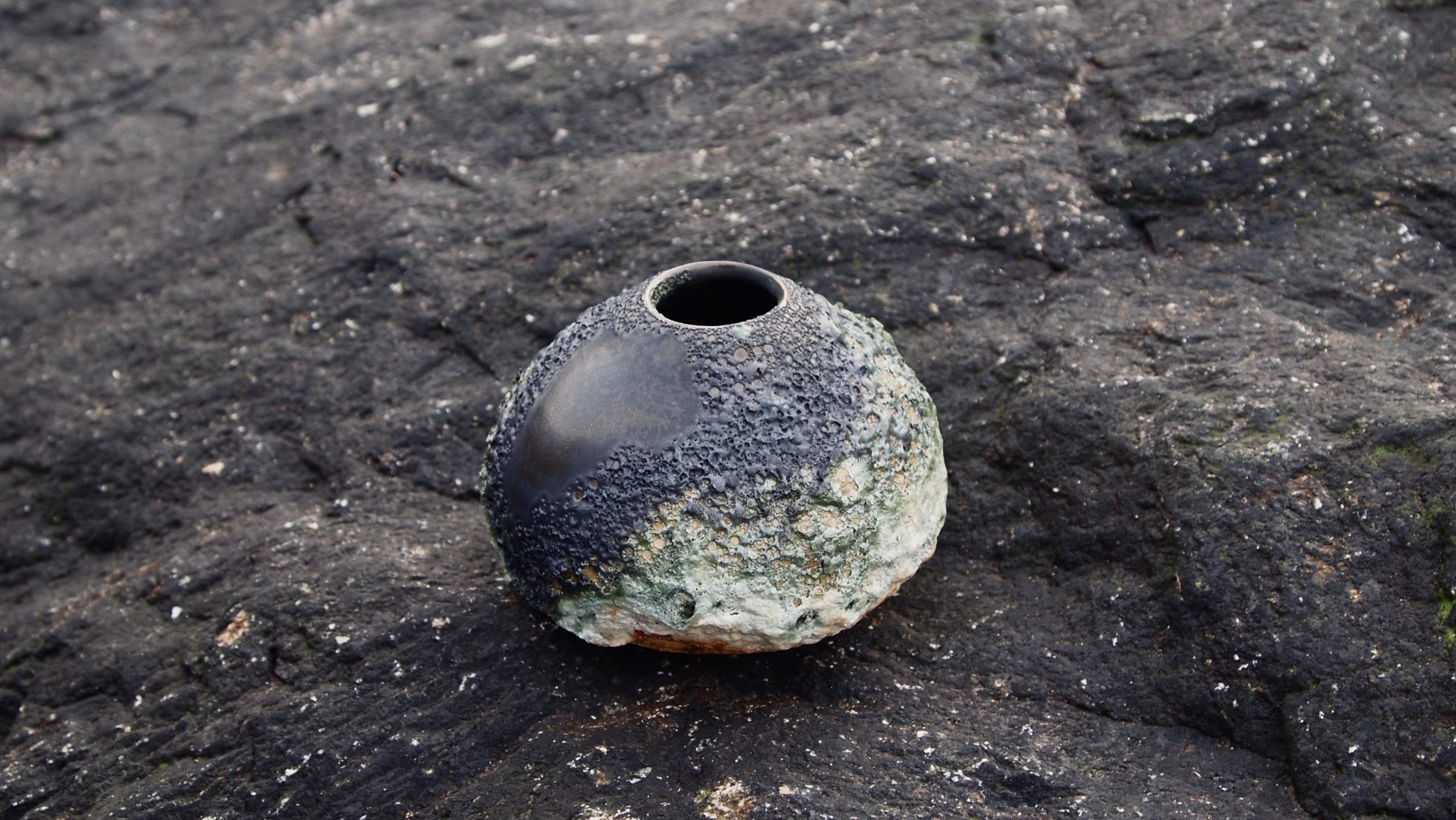 Alastair Smith Ceramics — wide studio shot or flat lay of fired tableware